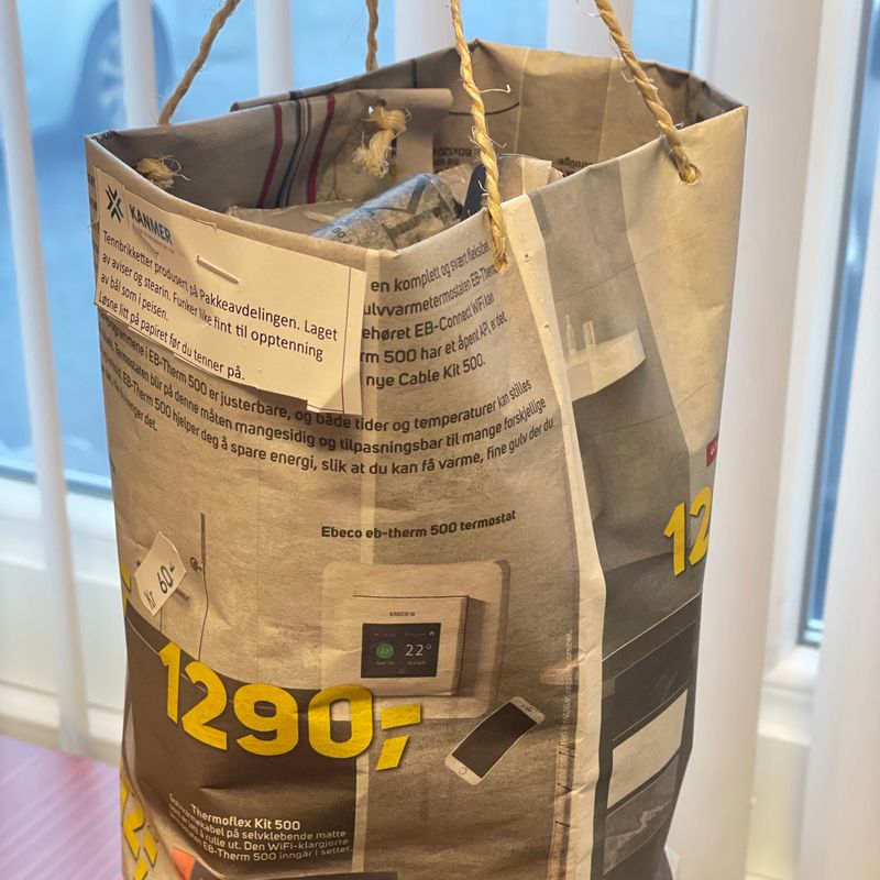 Tennbriketter i papirpose